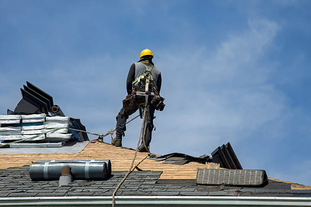 Professional Storm Damage Roof Repair technician working in Bradenton Beach, FL